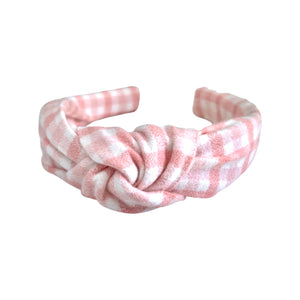 Feel like a graceful ballerina with our Ballerina Flannel Knotted Headband from SweetCityBows.com. Handcrafted with care, this headband features a charming flannel fabric with a ballerina-inspired twist. Add a touch of elegance and coziness to your little one's style. Limited quantities available, get your Ballerina Flannel Knotted Headband now and let your inner dancer shine!