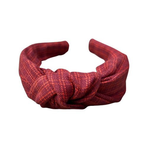 Cozy up with our Cozy Cranberry Knotted Headband from SweetCityBows.com. This delightful headband showcases a warm and inviting cranberry color, perfect for adding a touch of warmth and style to your look. Crafted with care, it guarantees both comfort and fashion-forwardness. Limited quantities available, get your Cozy Cranberry Knotted Headband now and embrace the coziness!